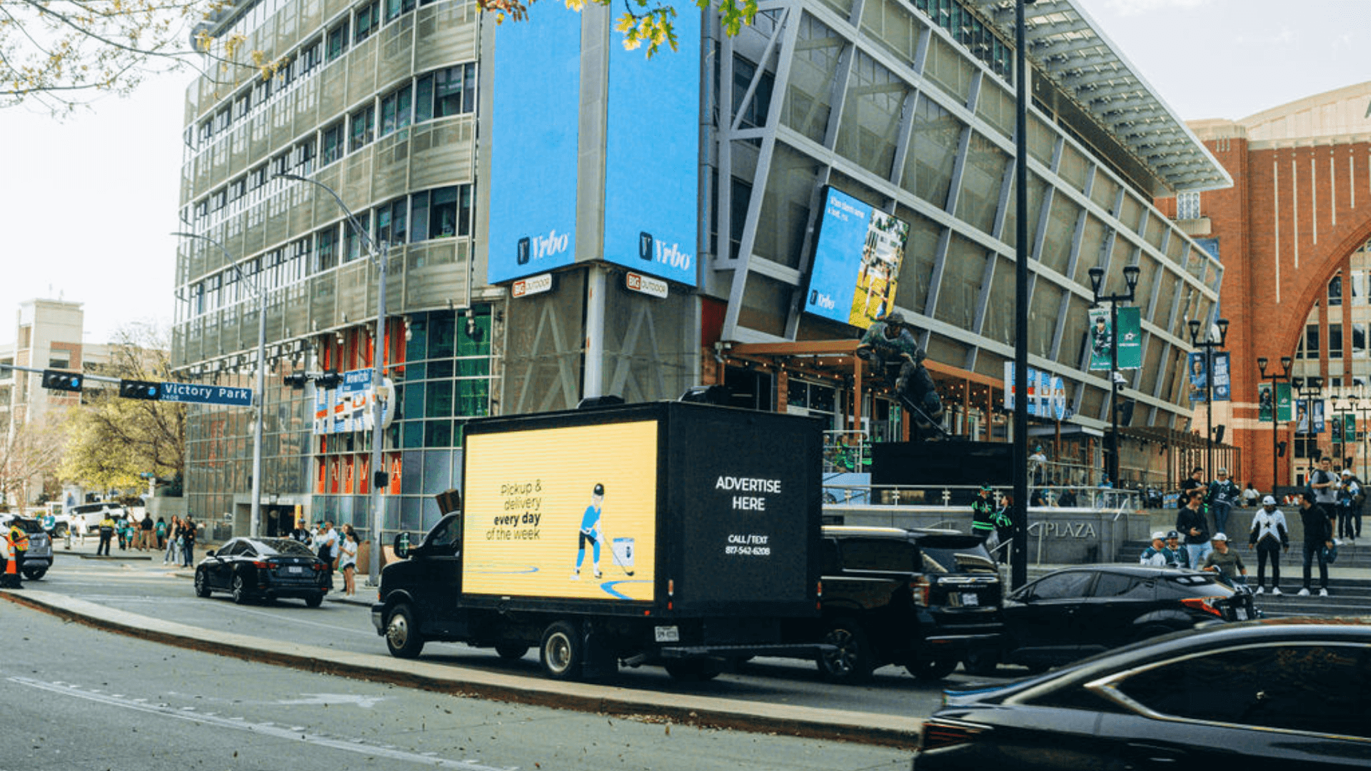 Mobile billboard vs social media ads in Dallas: a Byllboard LED truck on a city street